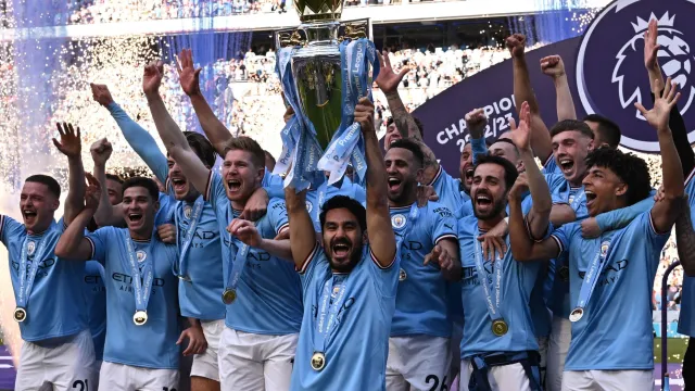 Ilkay Gundogan lifts Manchester City's 5th Premier League title in 6 years.