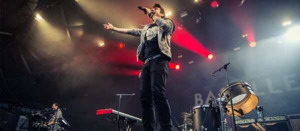 Bastille performing on stage humping.