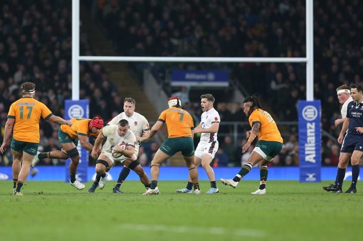 Australia playing rugby against England. 