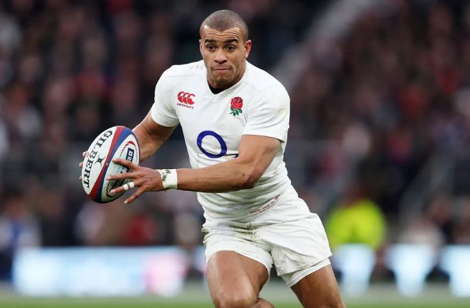 Jonathan Joseph in England Rugby kit - throwing rugby ball